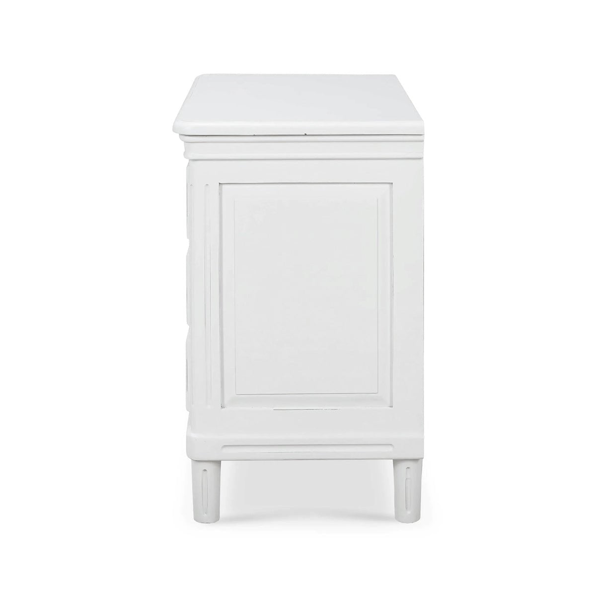 Side view of white nightstand showing panel design.