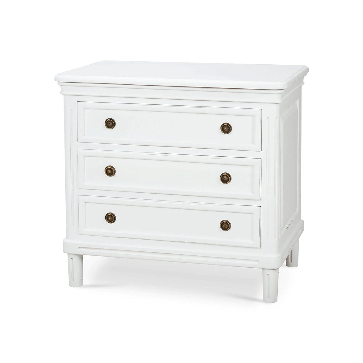 White nightstand with three drawers, angled view.