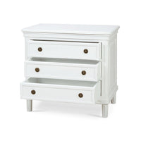 White nightstand with open drawers, angled view.