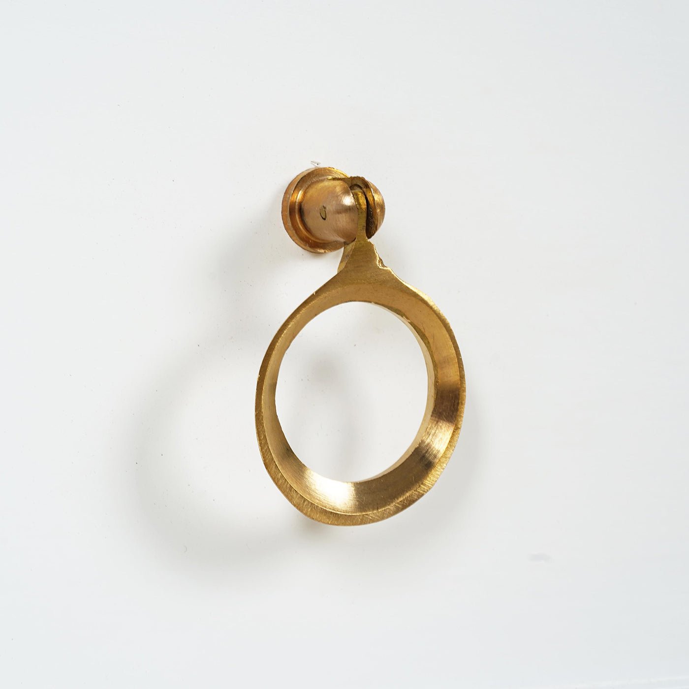 Gold handle detail for white European chest.