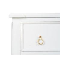 Close-up of top drawer and gold handle on dresser.