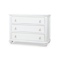 White chest of drawers, angled view with three handles.