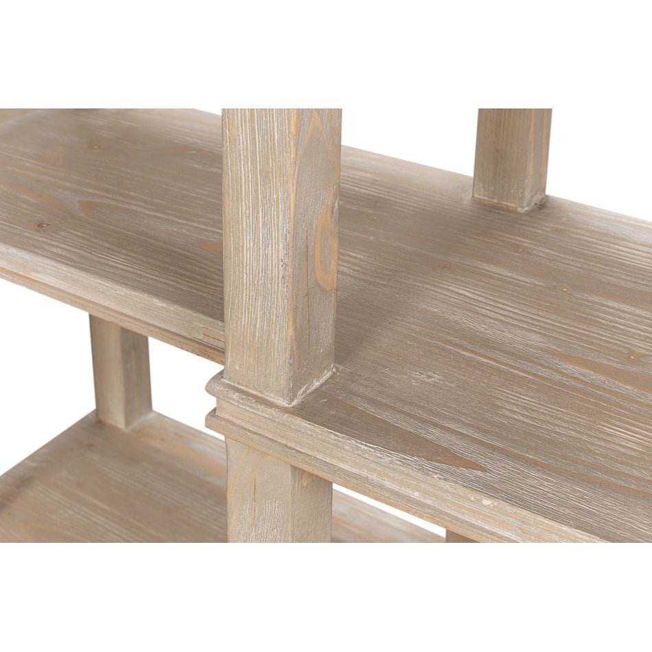 Shelf detail on rustic wooden console table.