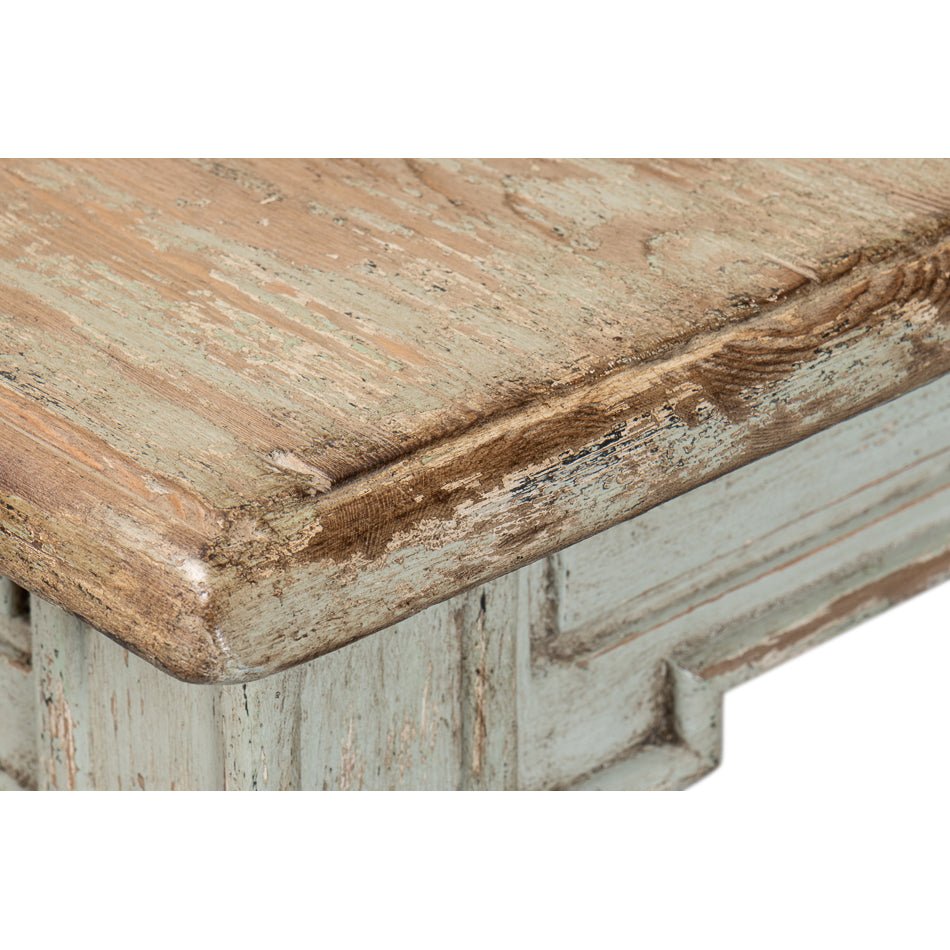 Rustic dining table, corner detail, aged wood.