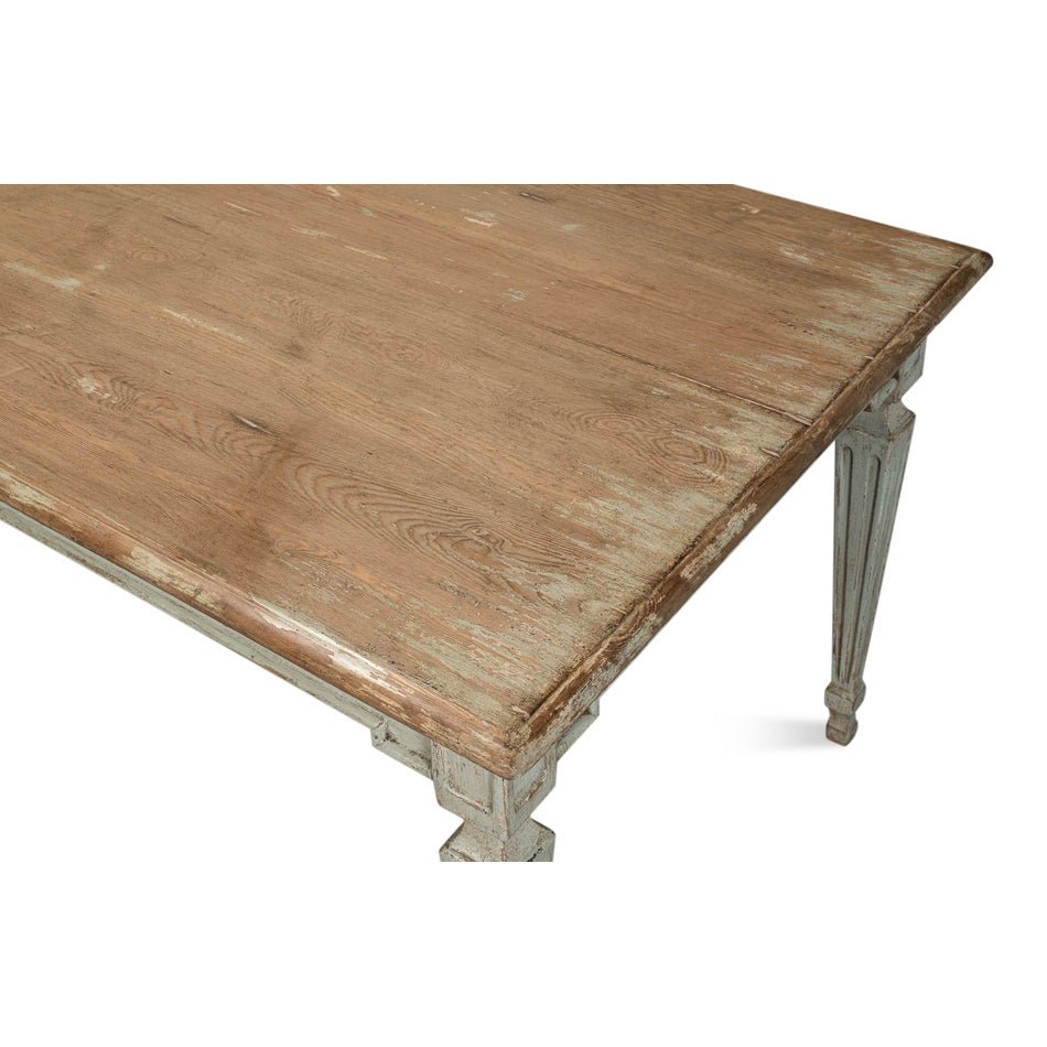 Rustic dining table, close-up of tabletop surface.