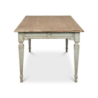 Rustic dining table, end view, carved details.