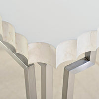 Scalloped edge detail of console table.
