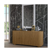 Sideboard in modern room with dark patterned walls.