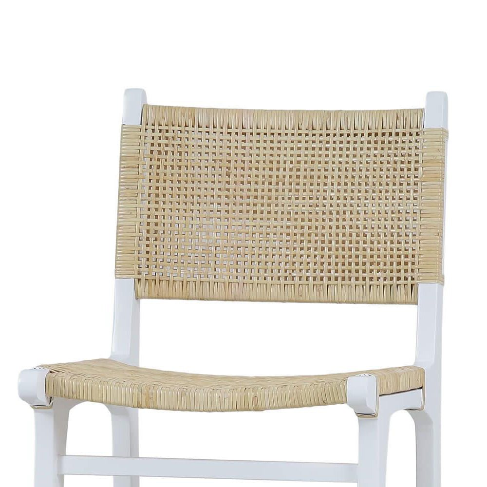 Close-up of rattan back and seat on counter stool.
