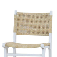 Close-up of rattan back and seat on counter stool.