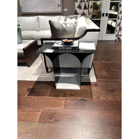 Side table in living room, next to sofa.