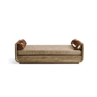 Front view of wood daybed with bolsters.