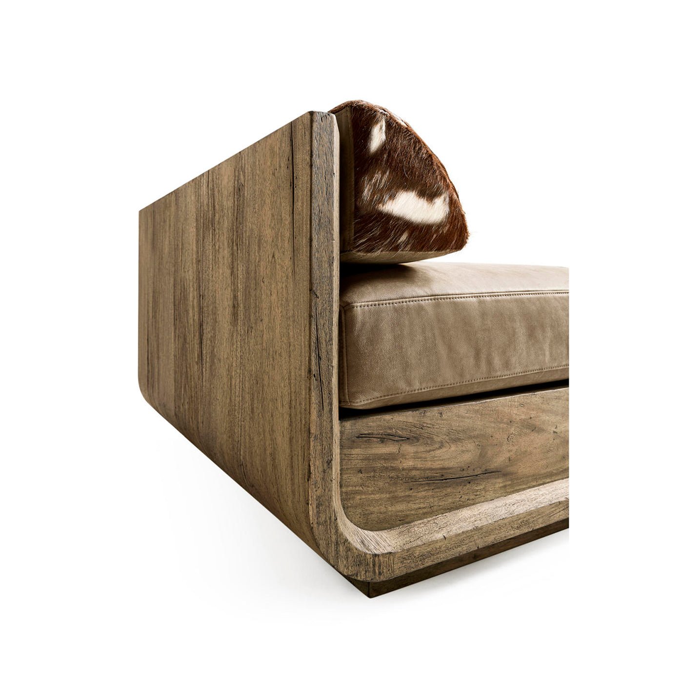 Angled view of wood daybed and bolster detail.