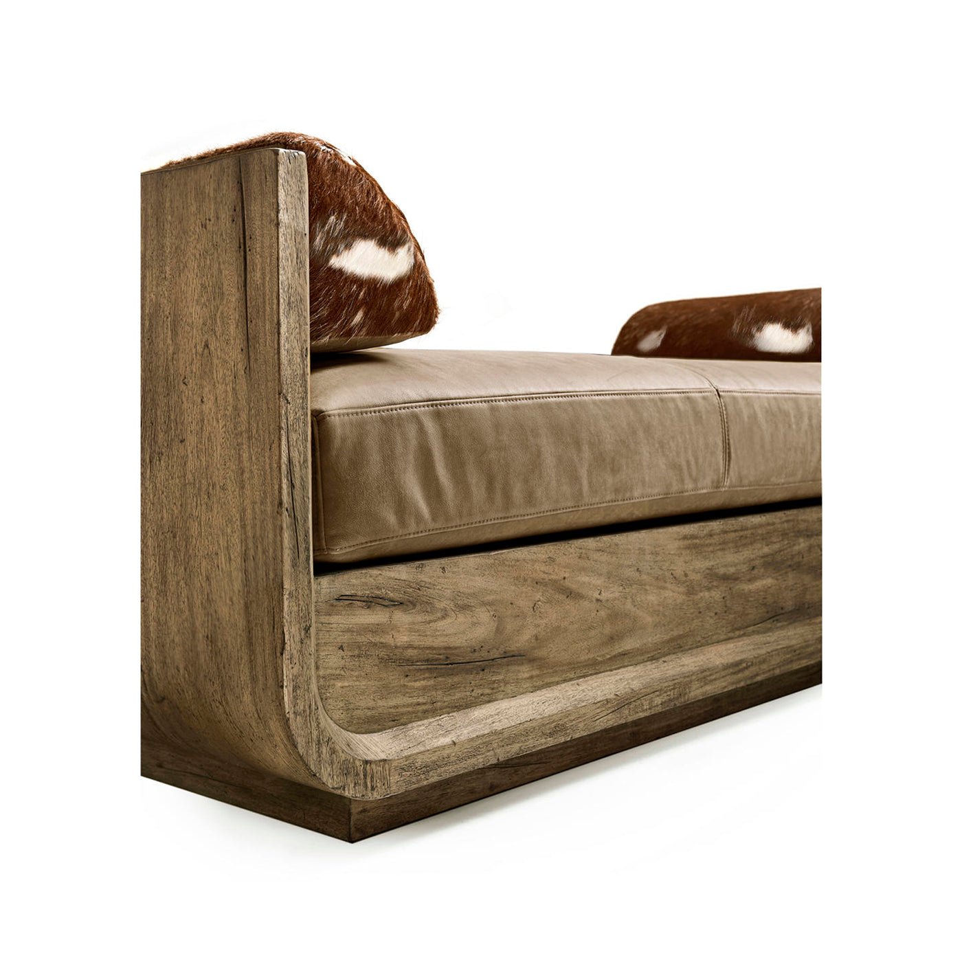 Wood daybed frame with bolster from side angle.