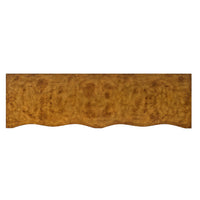 Top view of serpentine burl wood dresser.