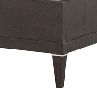 Corner view of bed leg and base detail.