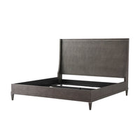 Empty modern bed frame without mattress, side view.