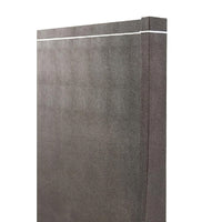 Side view of modern bed headboard, texture detail.
