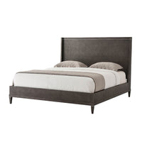 Modern bed with mattress and bedding, front view.