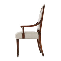 Side view of Sheraton Satinwood Armchair's armrest and leg design.