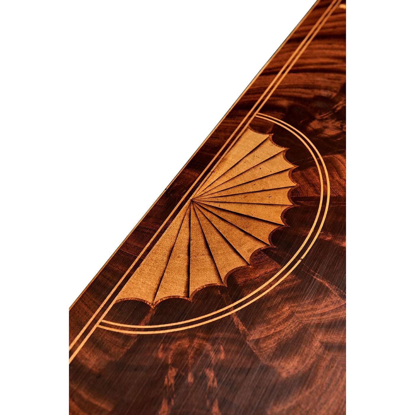 Top detail of commode with fan inlay design.