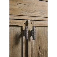Close-up of sideboard's cabinet door handles.