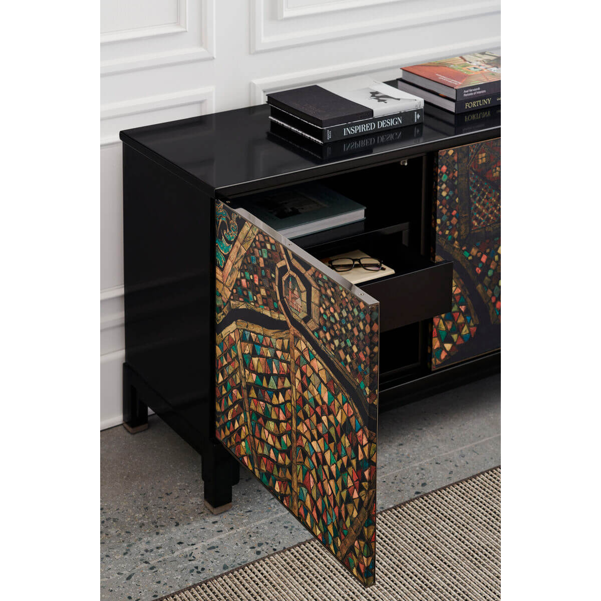 Close-up of Silk Road Sideboard with open door and drawers.