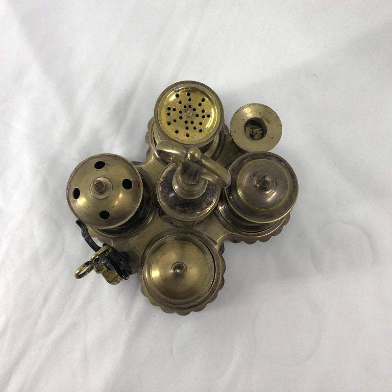 Overhead shot showcasing silvered brass standish details.