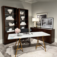 Room interior featuring dresser, shelves, and desk setup.