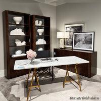 Room setup with black art deco dresser and modern decor.