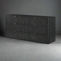 Black art deco dresser with six drawers on gray background.