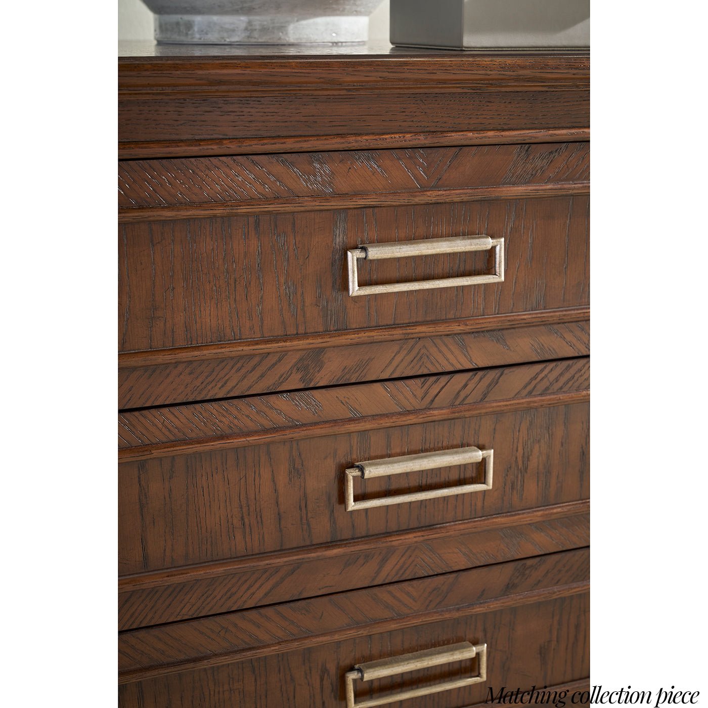 Close-up of dresser drawer handles and texture.