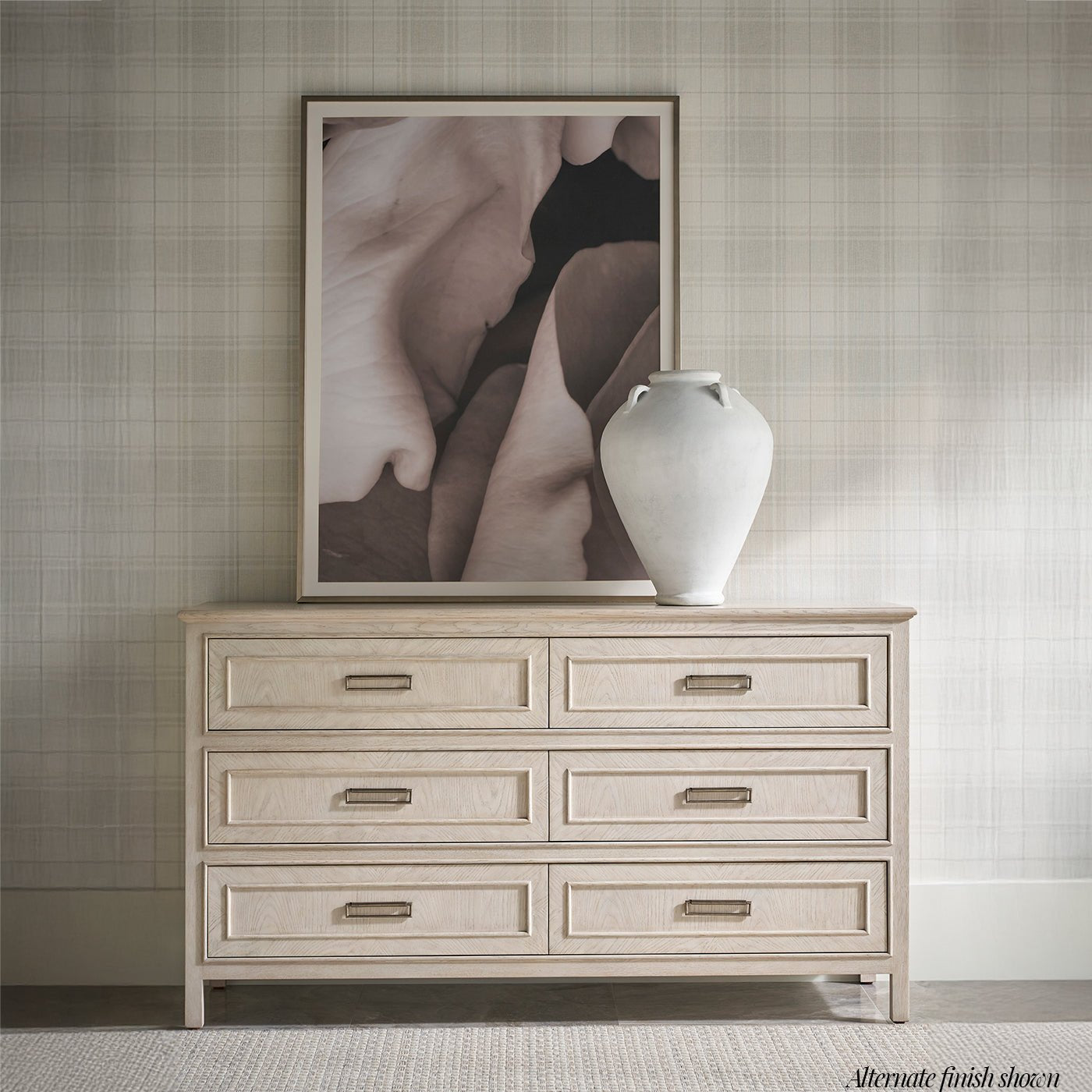 Alternate finish of oak dresser with decorative vase.