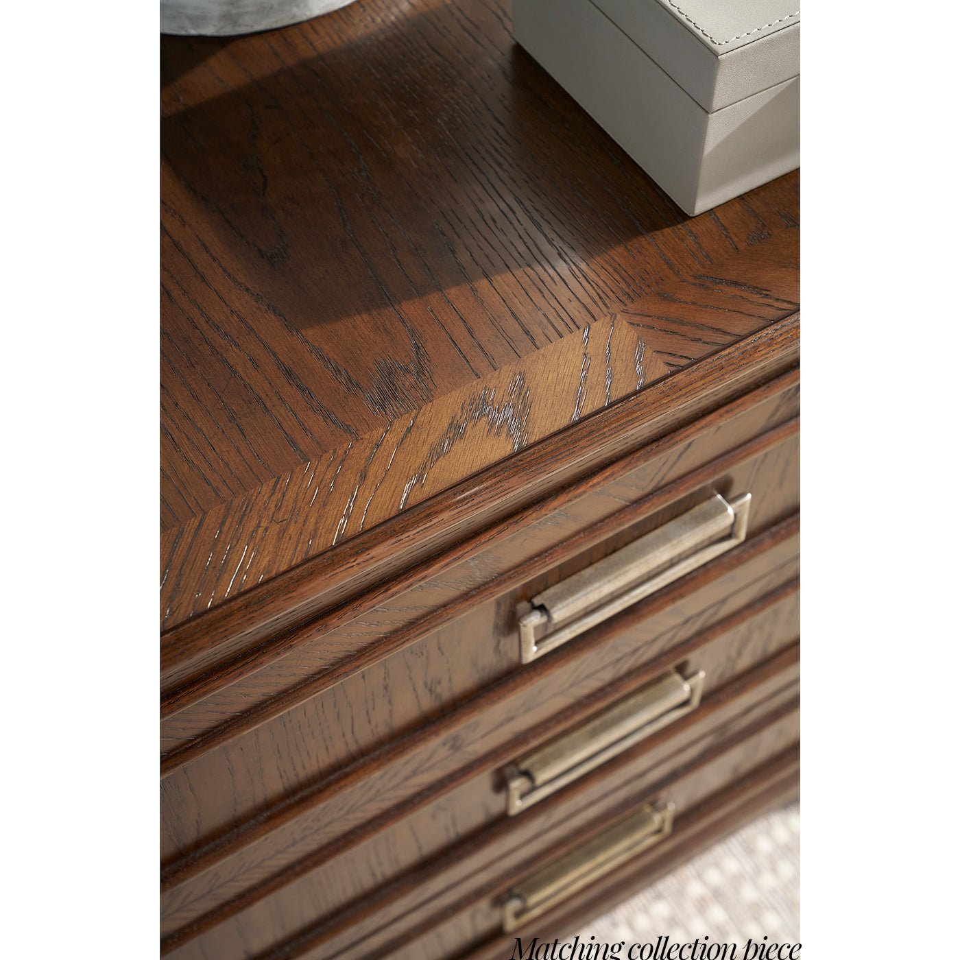 Top view of brown oak dresser surface.