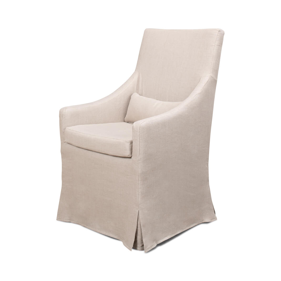 Beige skirted dining chair three-quarter view with cushion