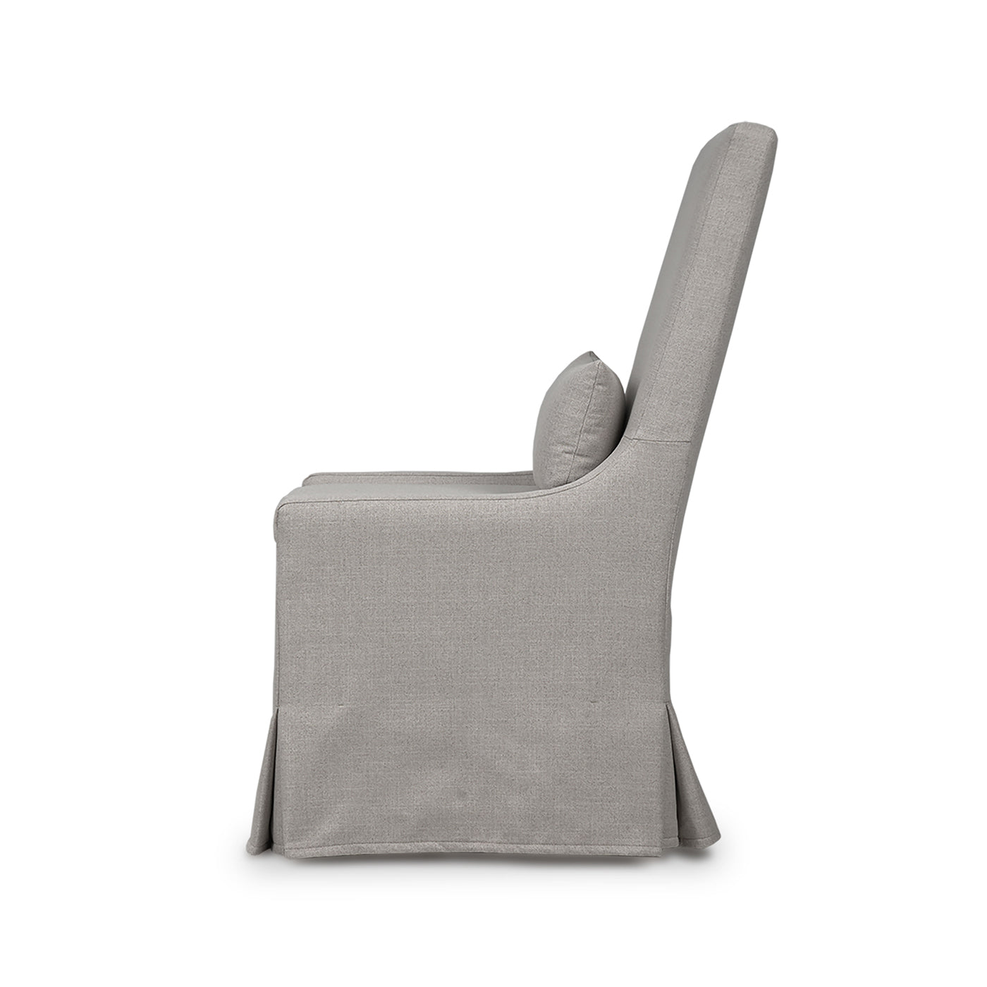 Slipcovered dining chair side profile view with cushion.