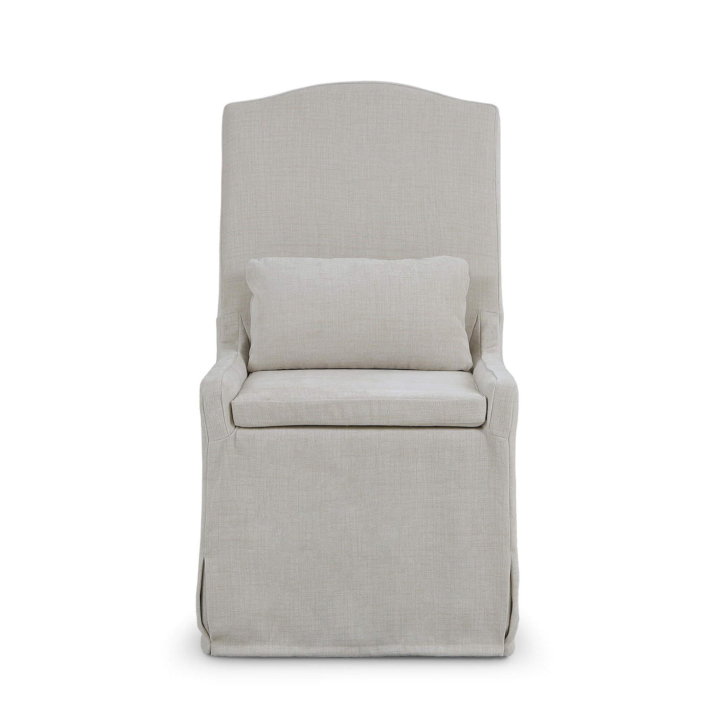 Straight-on slipcovered dining chair, light beige upholstery.