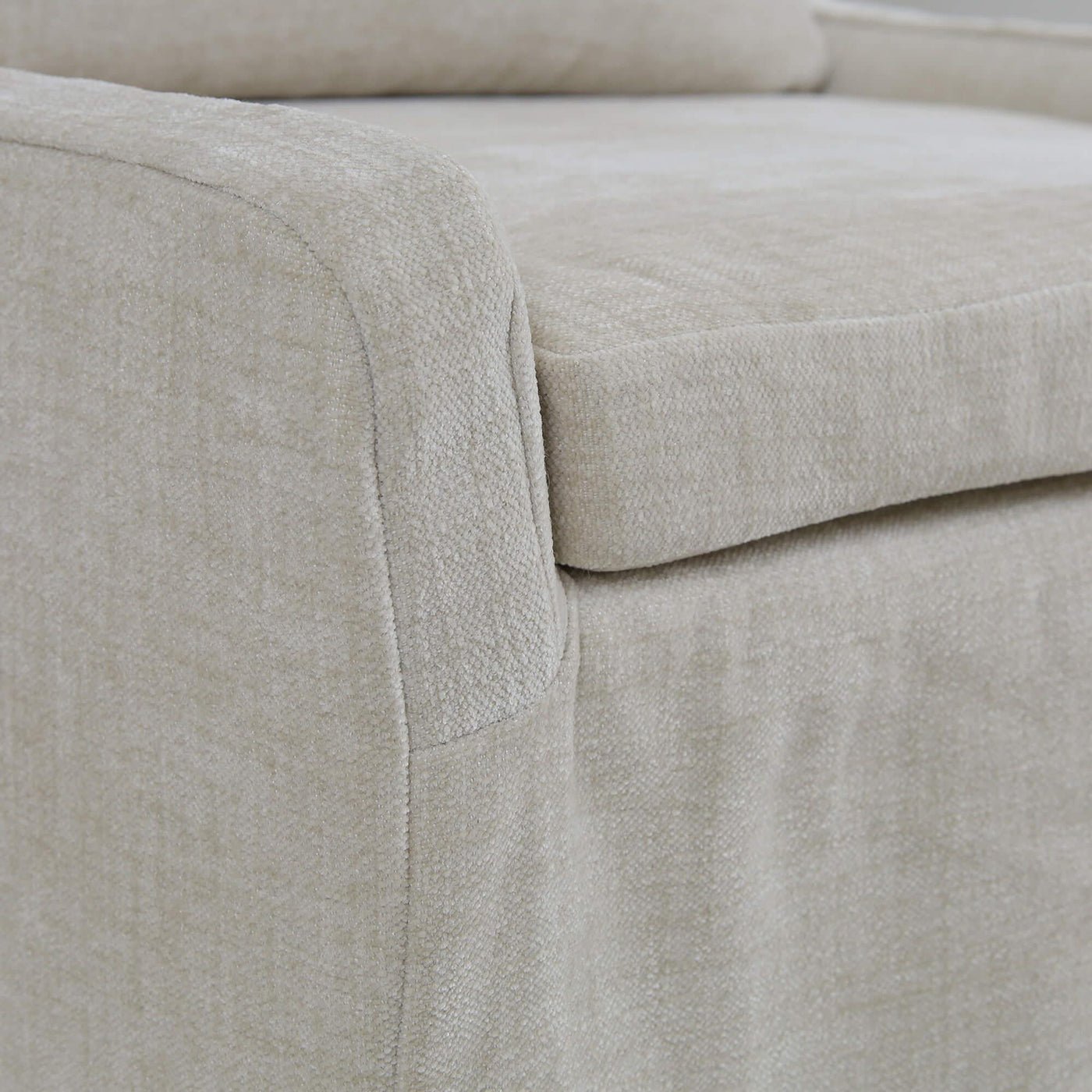 Seat corner slipcovered dining chair, light beige upholstery.
