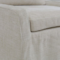 Seat corner slipcovered dining chair, light beige upholstery.