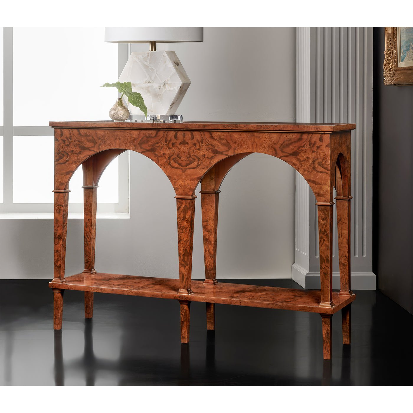 Console table with lamp, interior setting, side view.