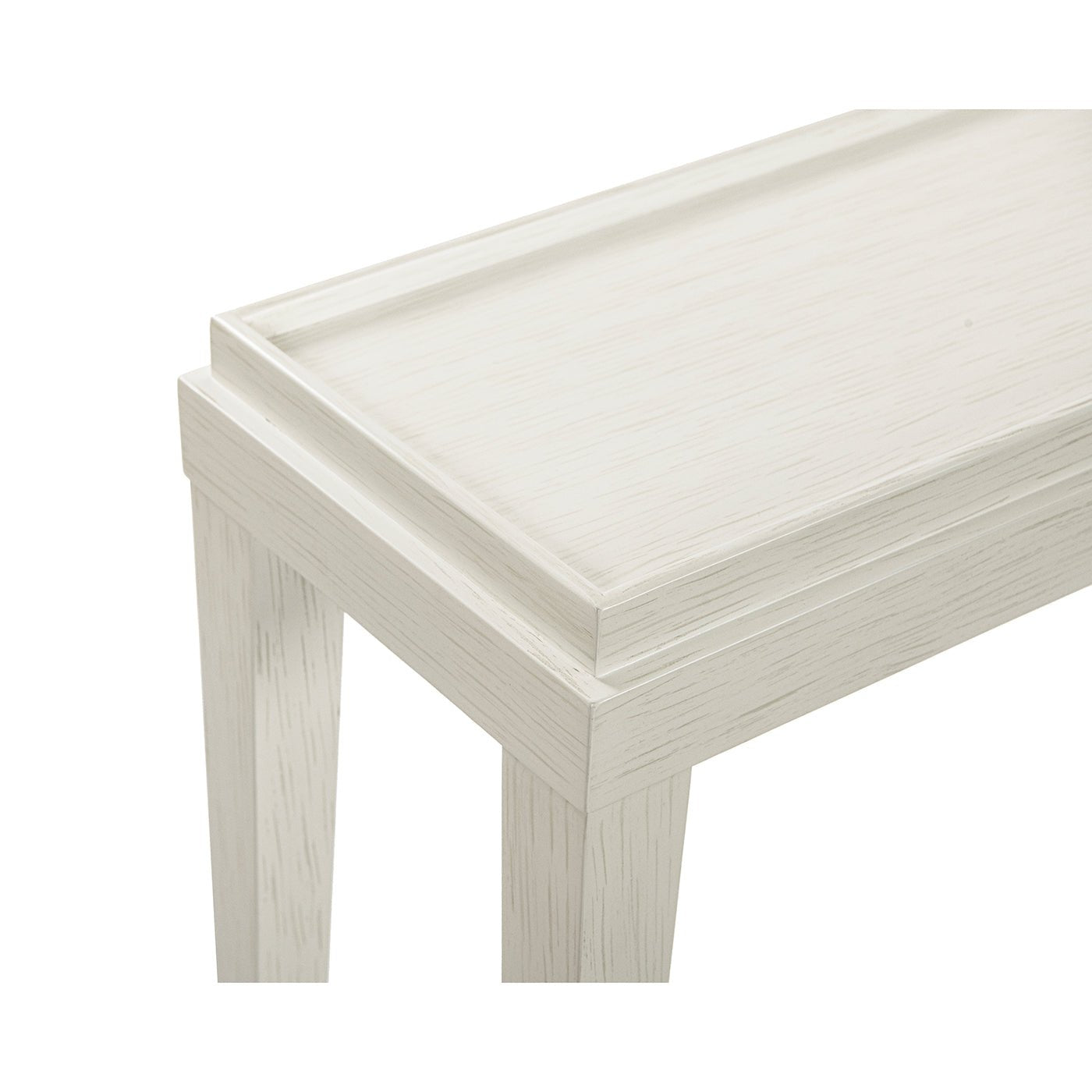 Detail of tabletop edge, small white console table.