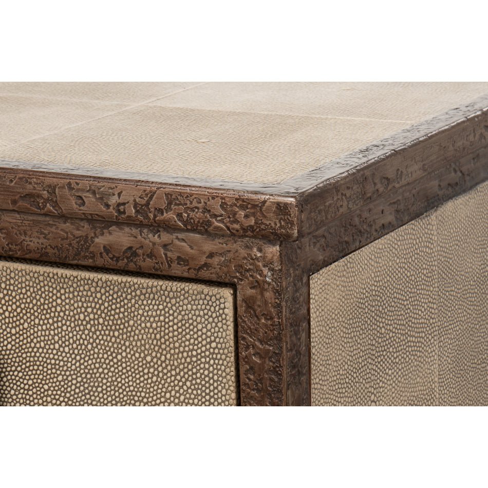 Close-up of sideboard corner, highlighting intricate wood detail.
