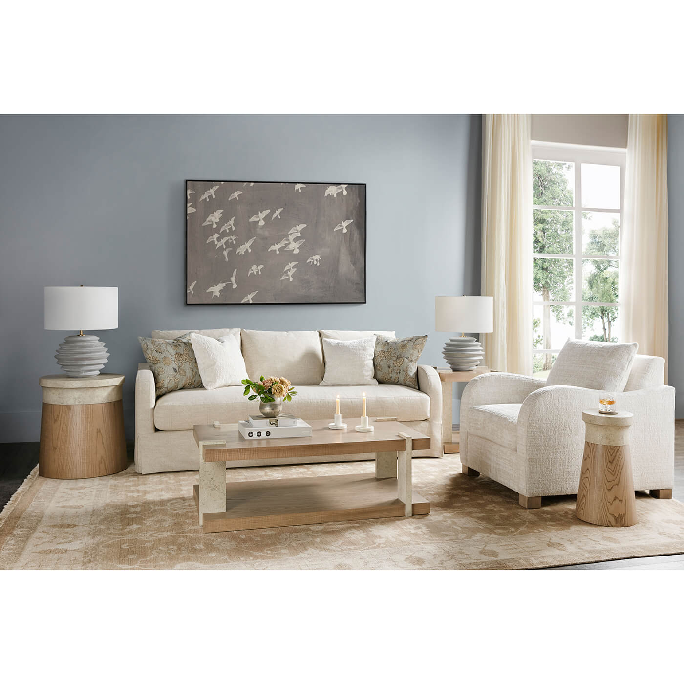 Living room with tables and sofa, decorative setup