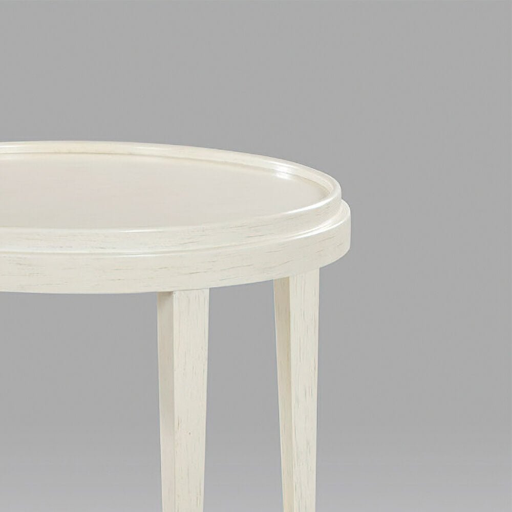 Detail of round end table, close-up on tabletop.