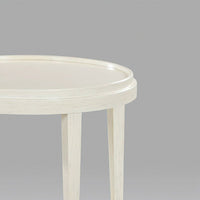 Detail of round end table, close-up on tabletop.