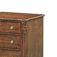 Close-up of intricate nightstand detailing on corner and top.