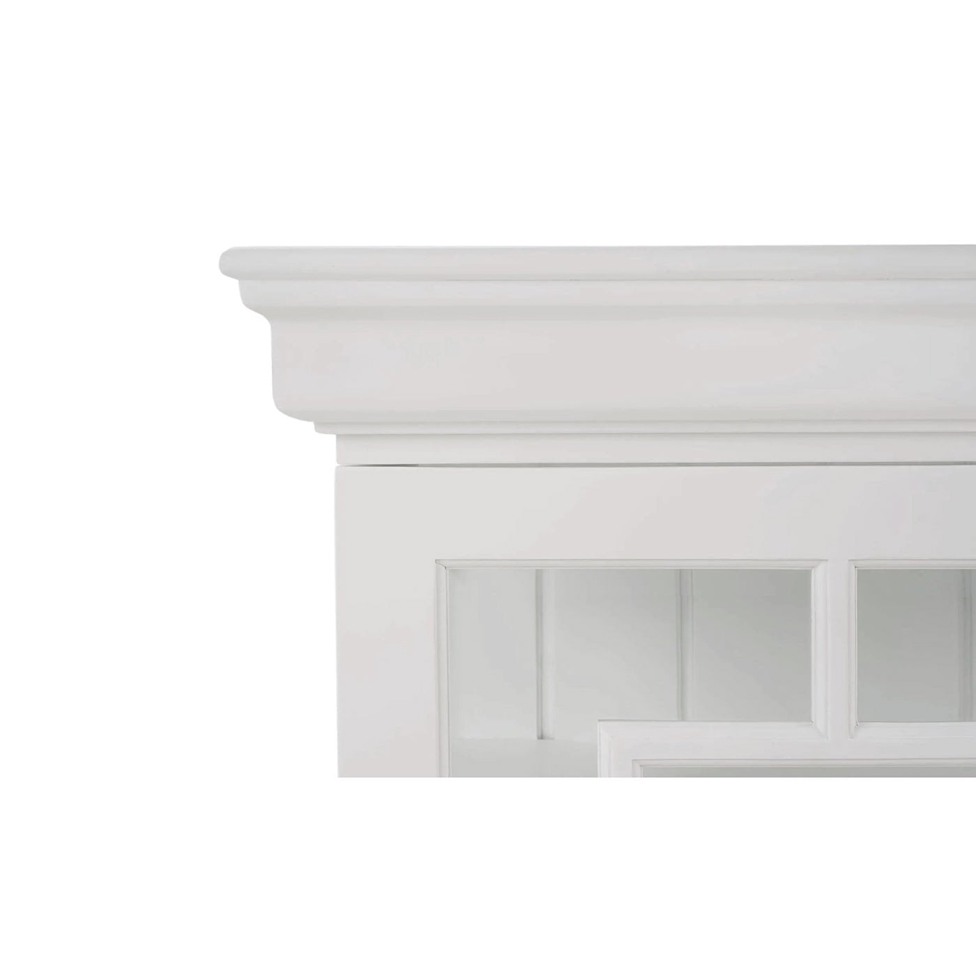 Close-up of white credenza's decorative top edge.