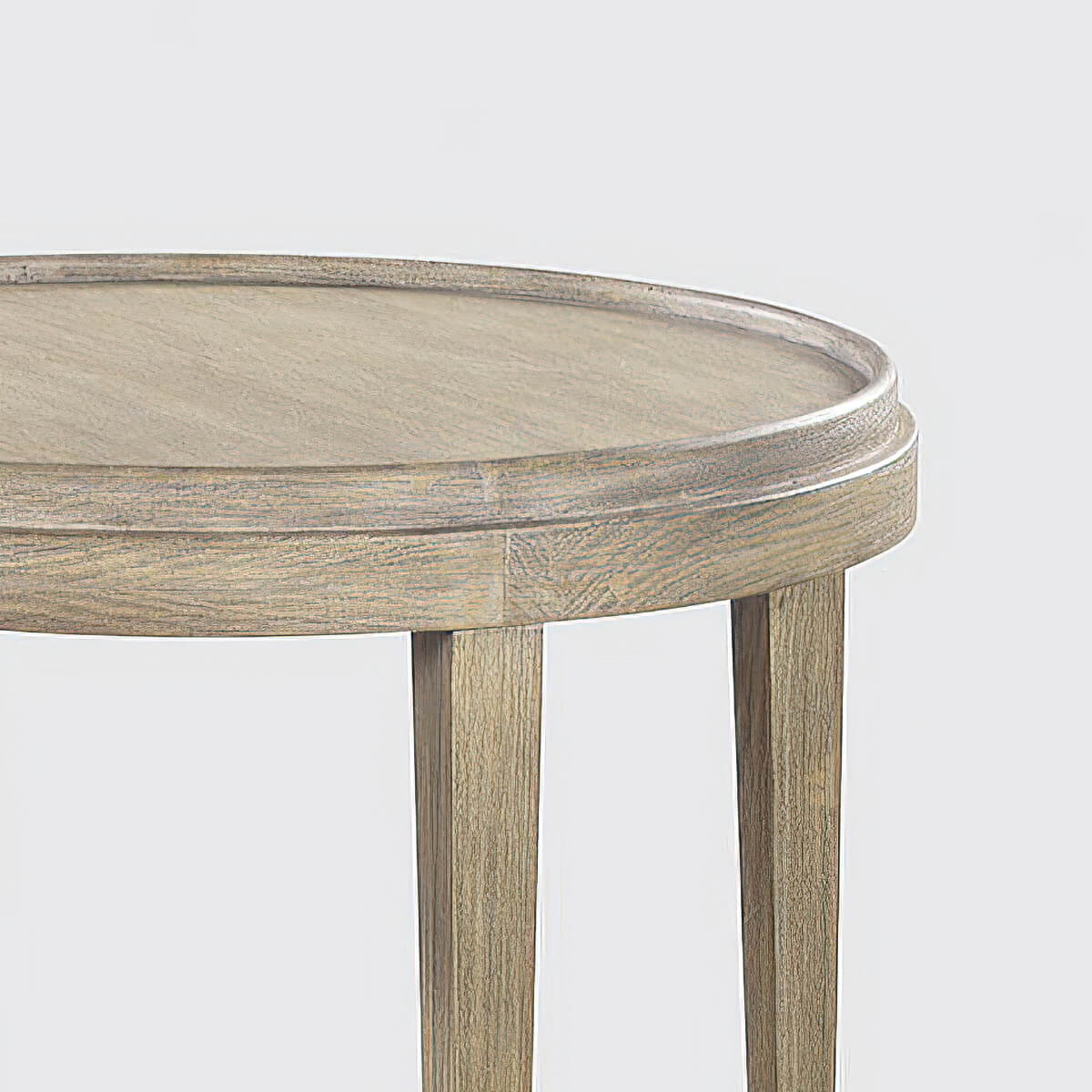 Close-up of wooden texture on round end table.