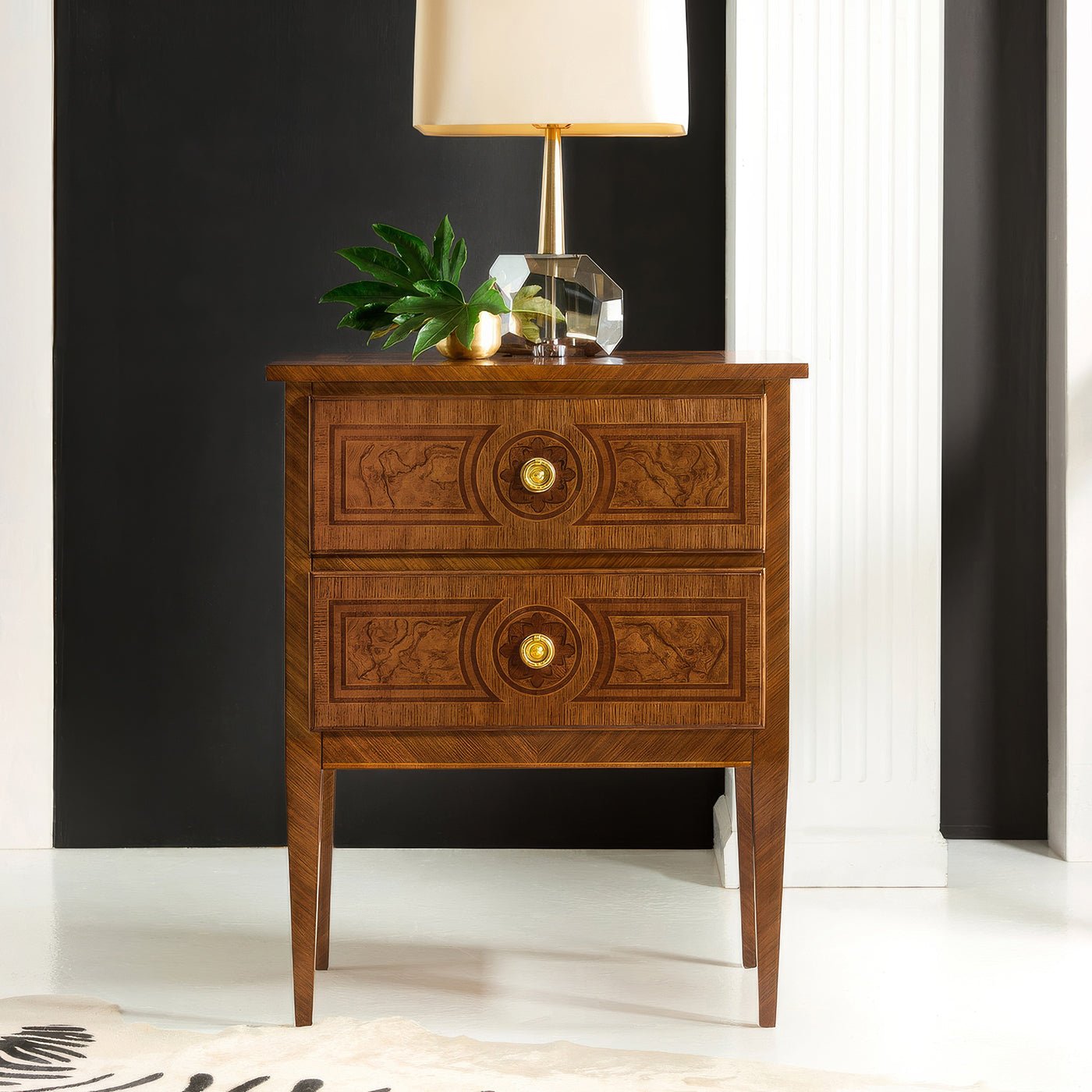 Small Louis XVI style burl nightstand with lamp on top.