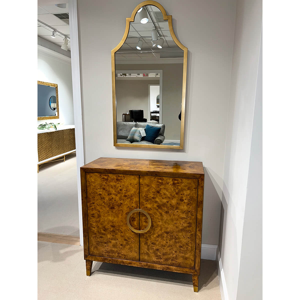 Small Mid-Century Burl Cabinet with wall mirror setup.